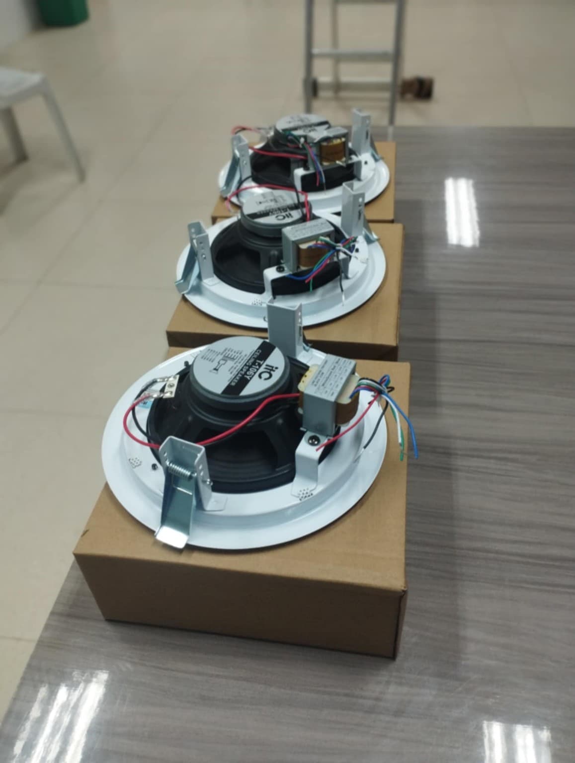 Ceiling speaker hardware prepared before installation