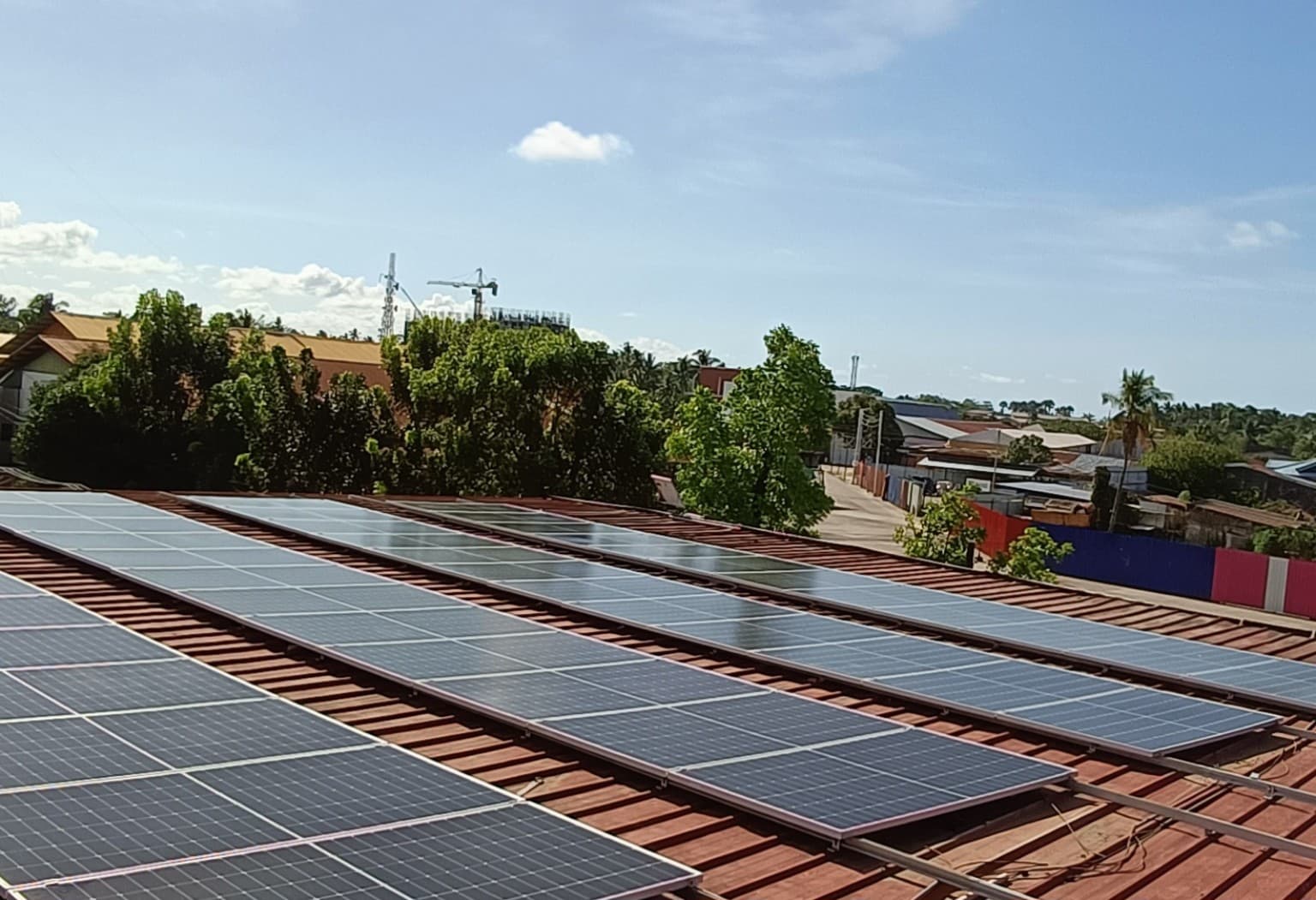 Completed wide rooftop solar panel array